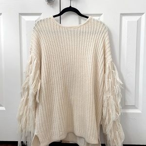 It’s a cute top, never worn but tags are off.